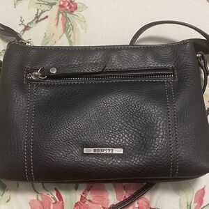 Roots Black Leather Crossbody Bag with Silver Accents